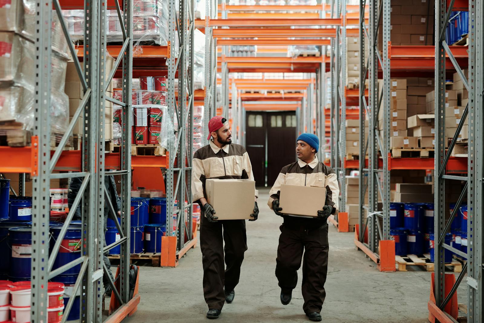 Warehouse worker sorting returned packages